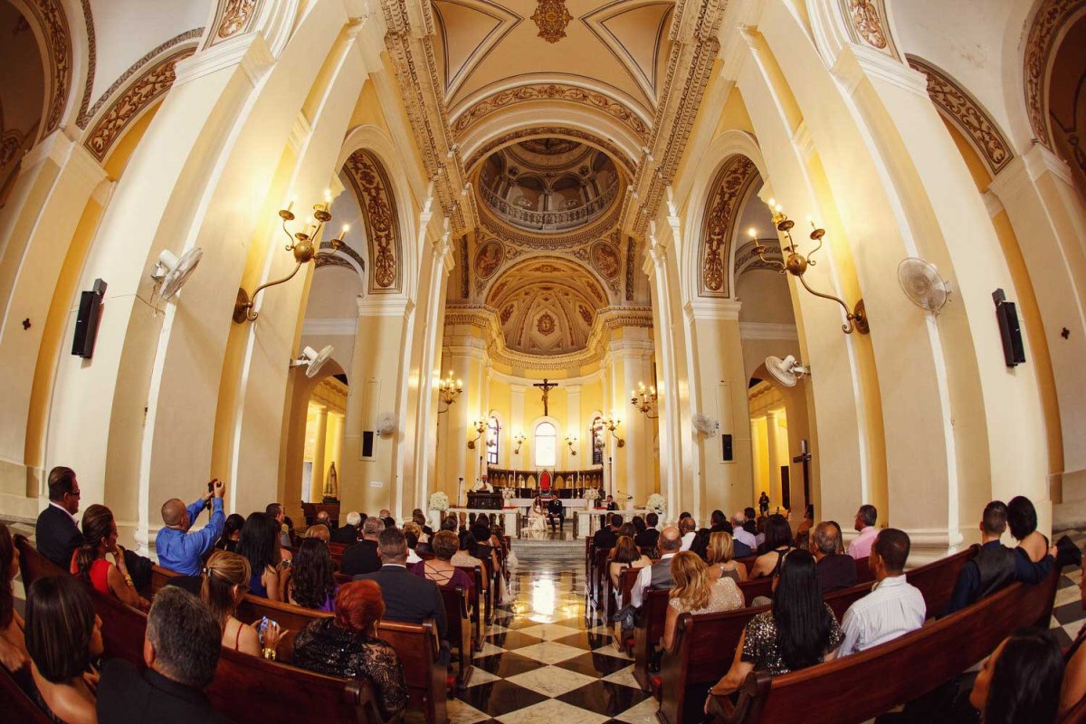 A wedding inside the historic Catedral de San Juan Bautista in San Juan, Puerto Rico. Photo by Noel Pilar.