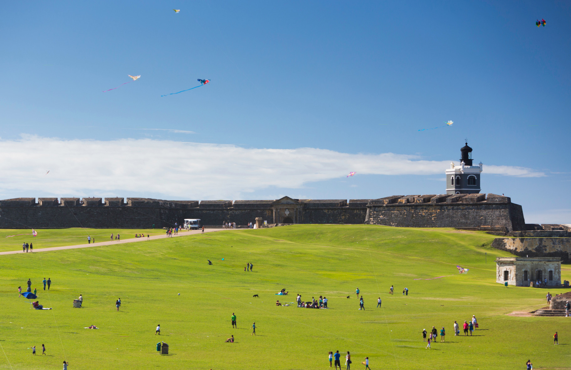 Visitors fly kites on the grounds of El Morro in Old San Juan.