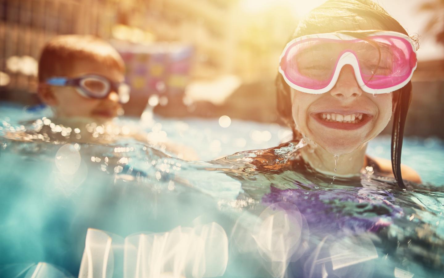 Kids enjoying a pool.