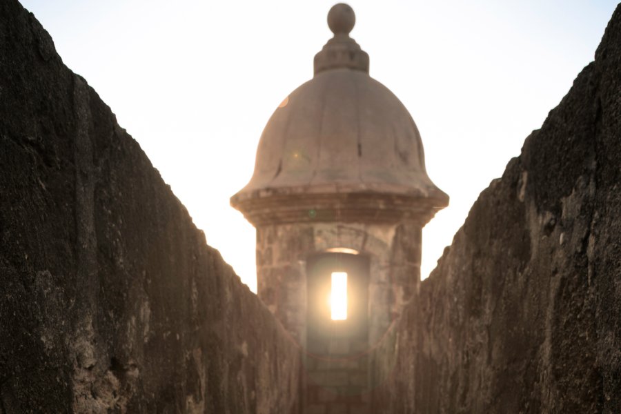 The sunlight shines through the window of a guard tower at El Morro.