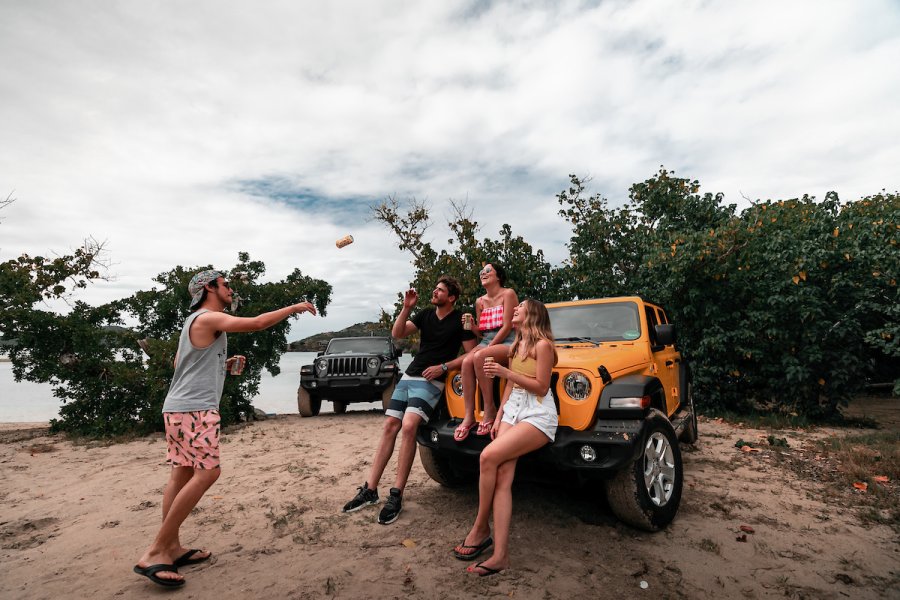 A group of friends talking during their road trip around Culebra. 