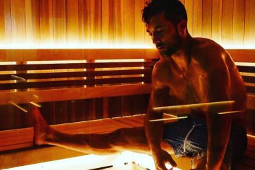 A man spreads out in a sauna at Remedy Chiropractic + Cryospa in San Juan, Puerto Rico.