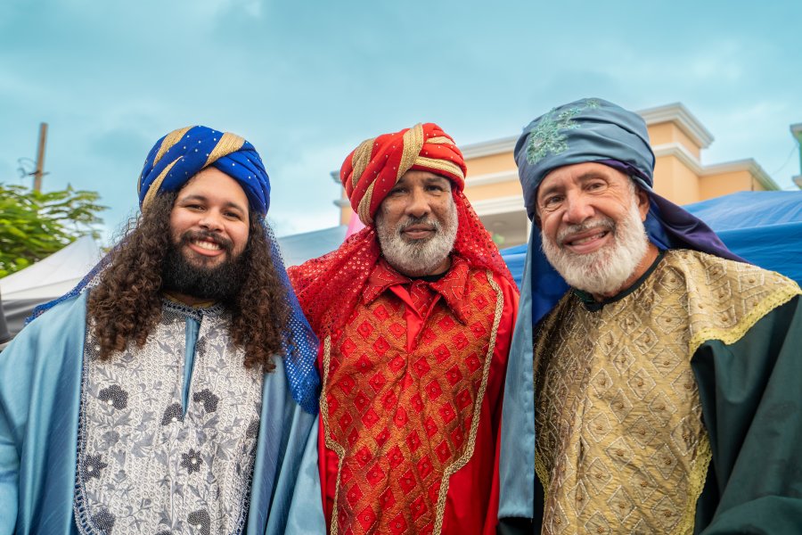Three men dressed as the Three Wise Men smile during the Fiesta de los Reyes Magos celebration in Puerto Rico.