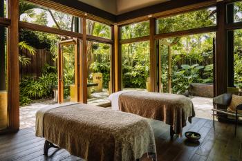 Side-by-side massage tables in the open-air Spa Botanico at the Ritz-Carlton Dorado.