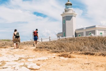 Young people visiting Cabo Rojo's lighthouse.