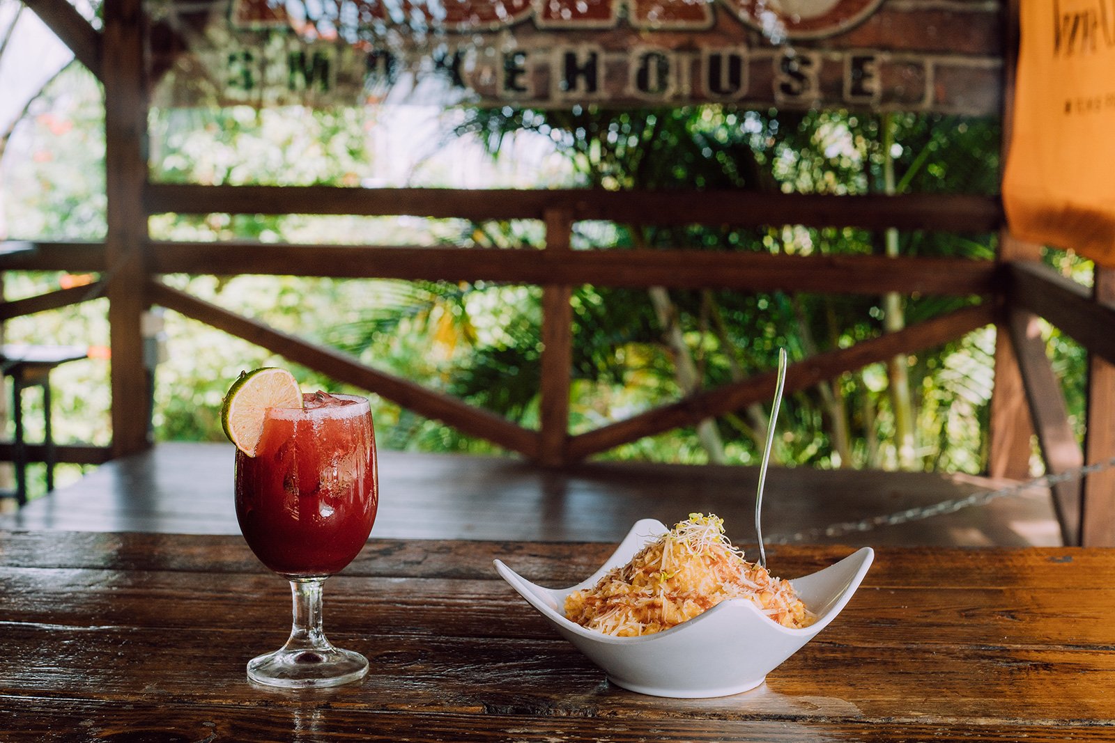 A glass of sangria and creole cuisine at ASAO smokehouse in Ciales