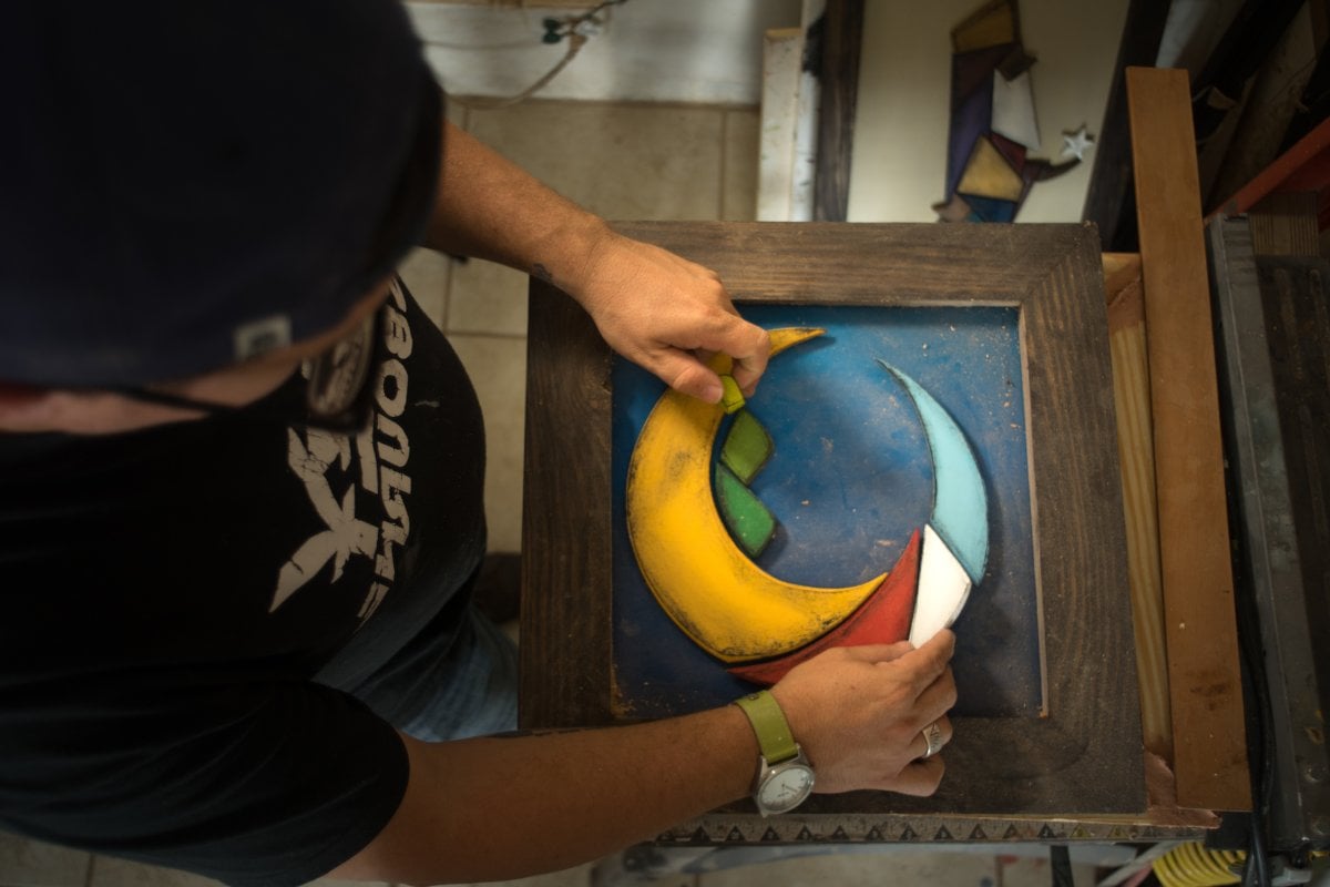 Artisanal craftsman working on a handmade piece.