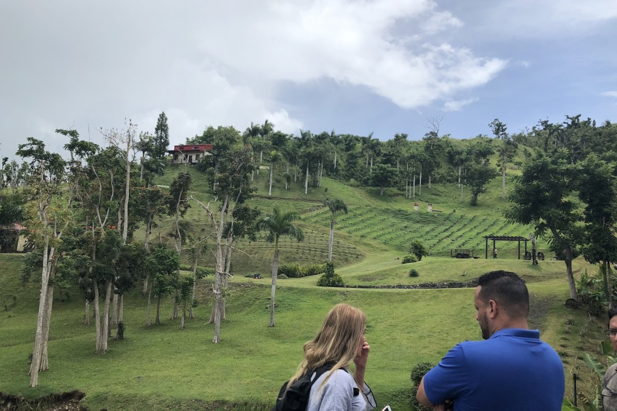 Visitors overlook the fertile fields at Hacienda Muñoz.
