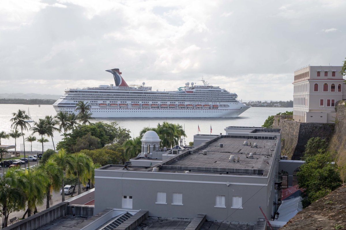 A cruise ship sails by off the coast of San Juan.