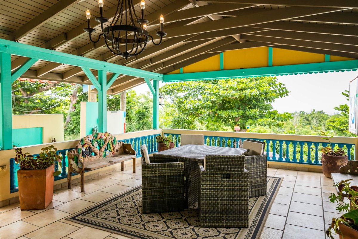 The lobby of the Lazy Parrot Hotel in Rincón