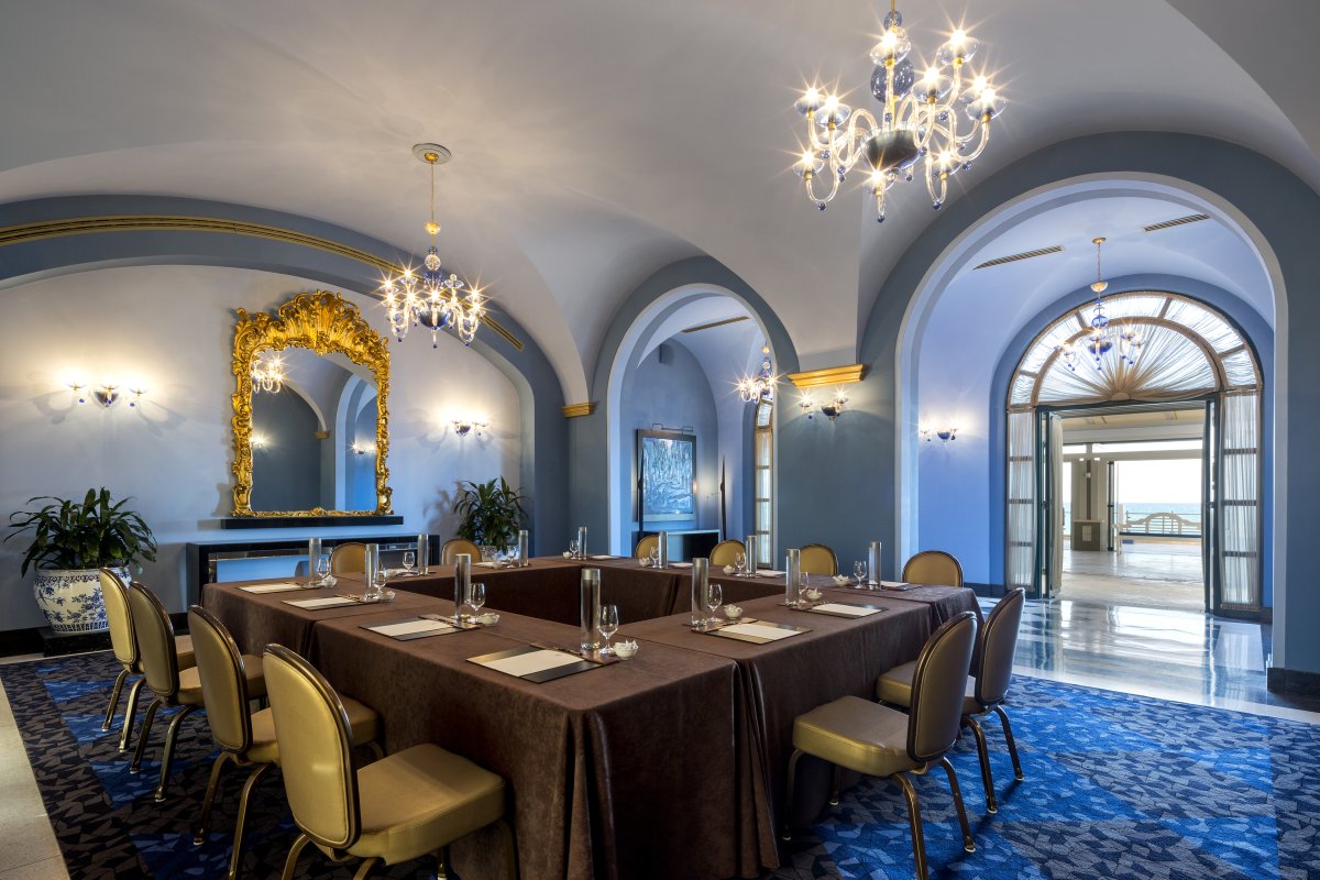 Glittering chandeliers hang in the Salon Azul meeting room at the Condado Vanderbilt Hotel.