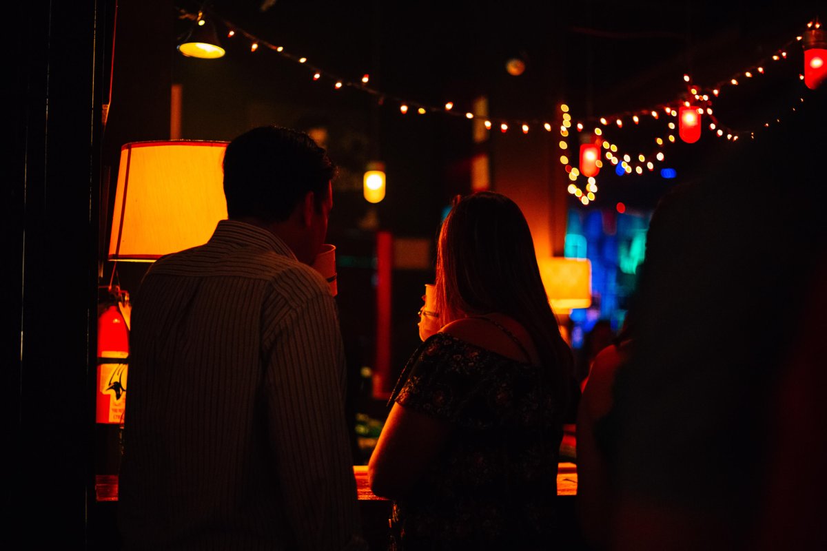 People enjoying a drink and music at La Respuesta 