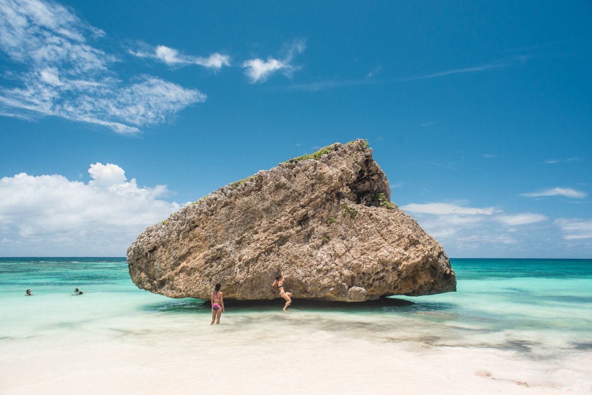 a large boulder on Playa Cocos Island Beach.