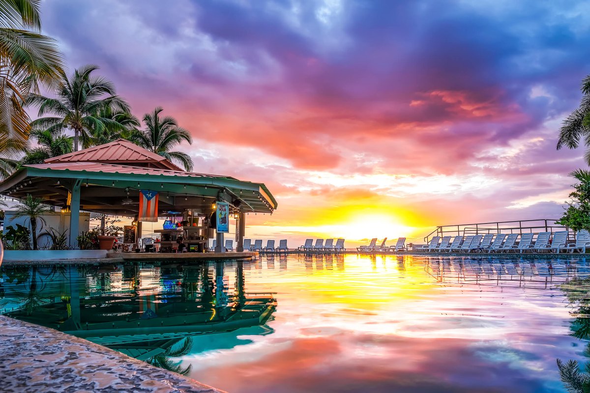 Poolside sunset at the Rincón of the Seas Grand Caribbean Hotel.