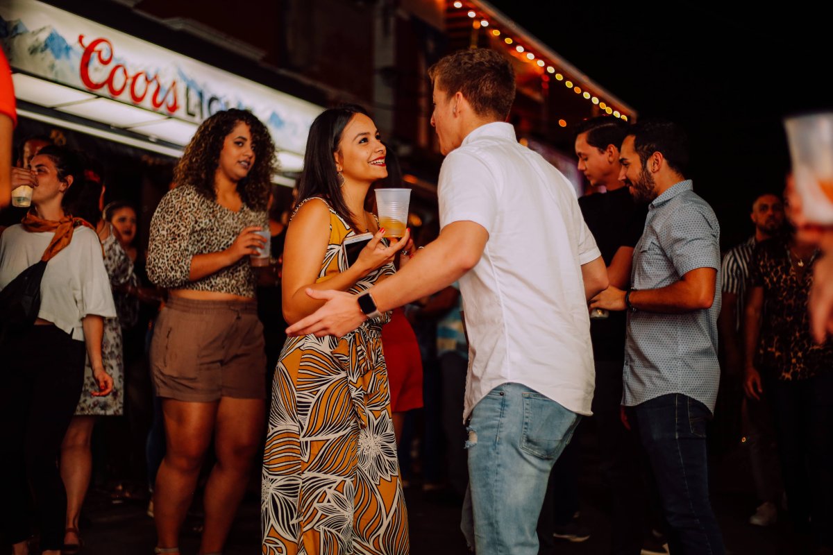 A group of people dancing at Taberna Los Vázquez