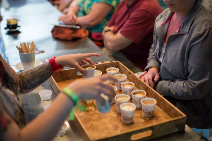 A group samples Puerto Rican coffee on a Flavors of San Juan food tour.