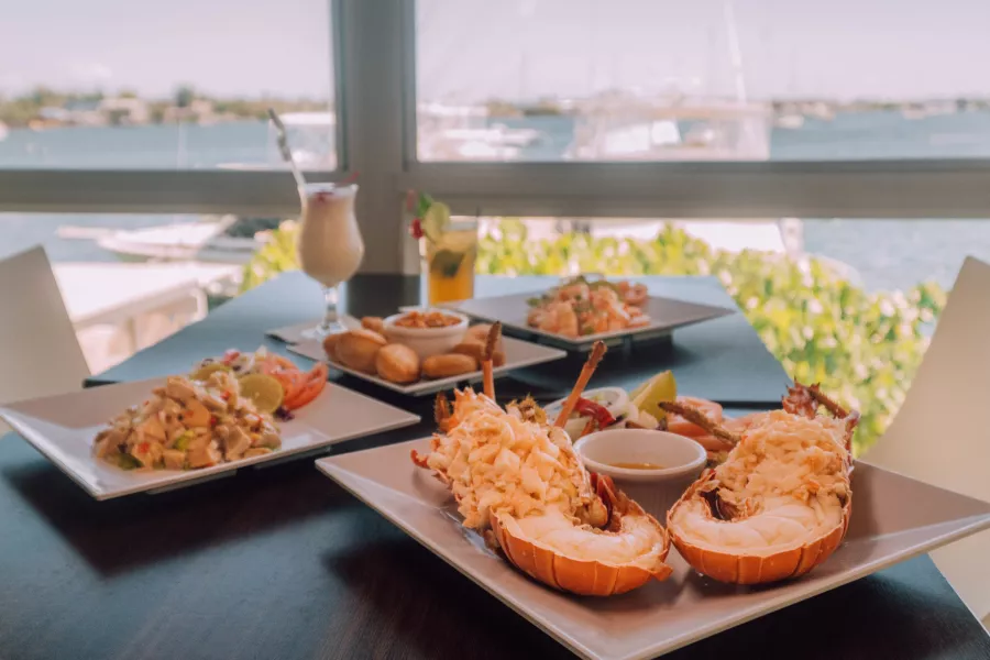 Lobster and other seafood on an outdoor table at El Dorado Restaurant in Salinas.