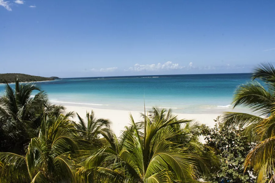 Panoramic view of Flamenco Beach in Culebra, Puerto Rico, known for its white sands and crystal-clear waters.