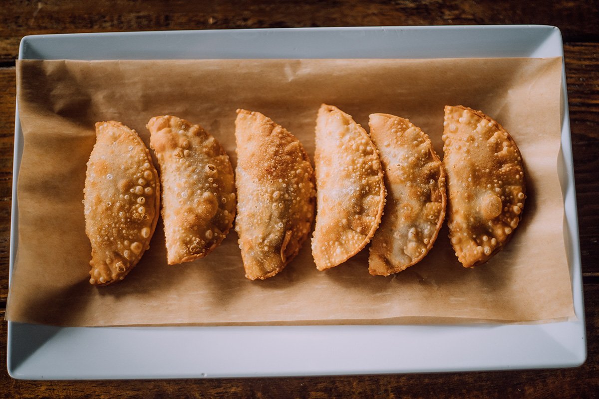 A plate of pastelillos from ASAO smokehouse in Ciales