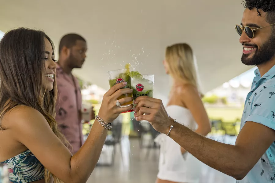 Guests enjoying handcrafted cocktails during a rum tasting experience in Puerto Rico.