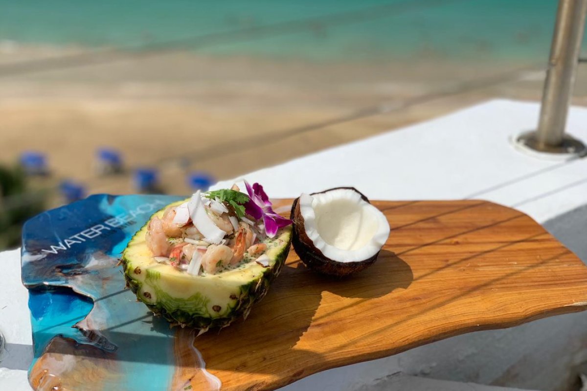 Shrimp ceviche is served in a pineapple at the SJ Water and Beach Club Hotel