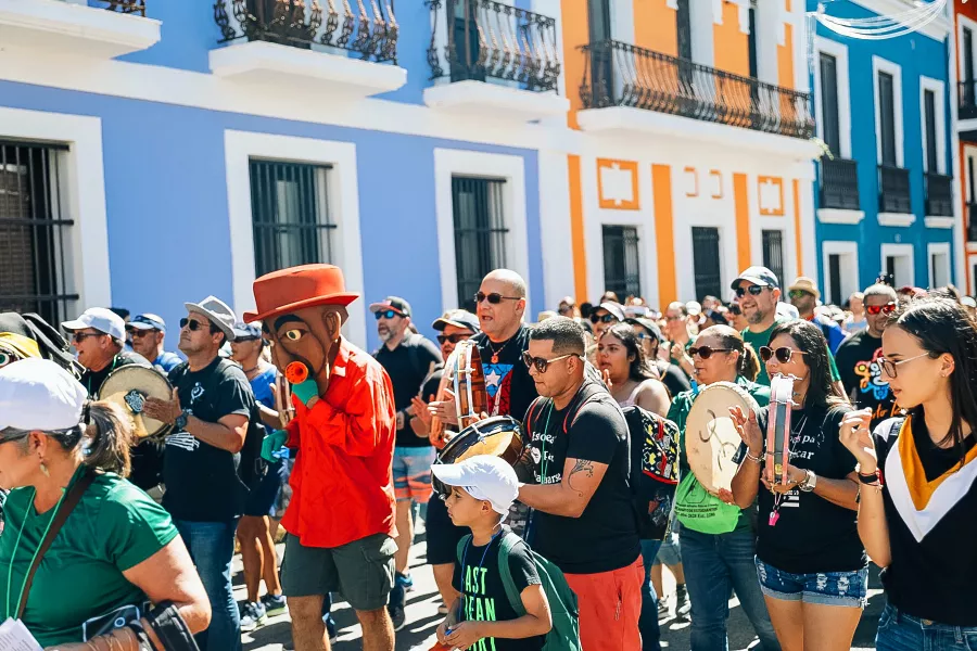 People celebrating the Fiestas de la Calle San Sebastián, one of the most vibrant Puerto Rican celebrations.