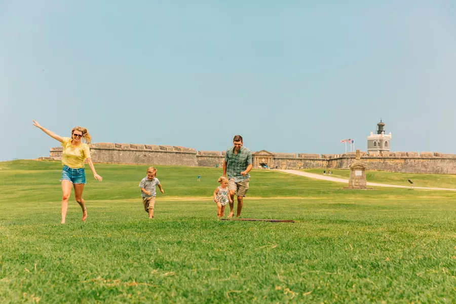 Children playing at El Morro fort in Old San Juan, a fun thing to do in Puerto Rico with kids