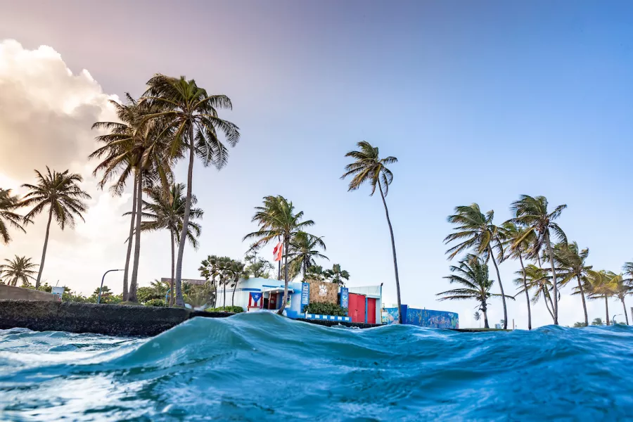 Calm waters at El Escambron beach, a popular location for snorkeling in Puerto Rico.