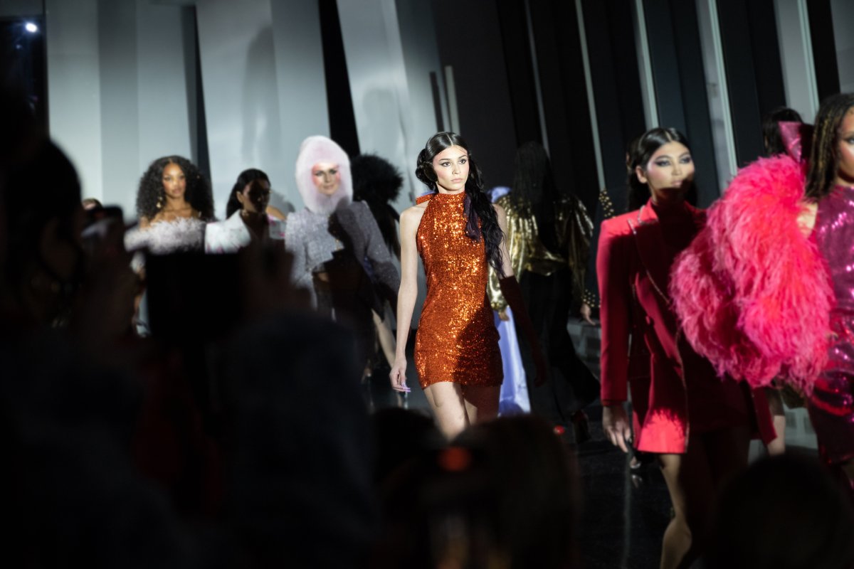 Model Neiris Gabriela wears Christian Cowan's Puerto Rico Sunshine dress on the runway at New York Fashion Week 2022