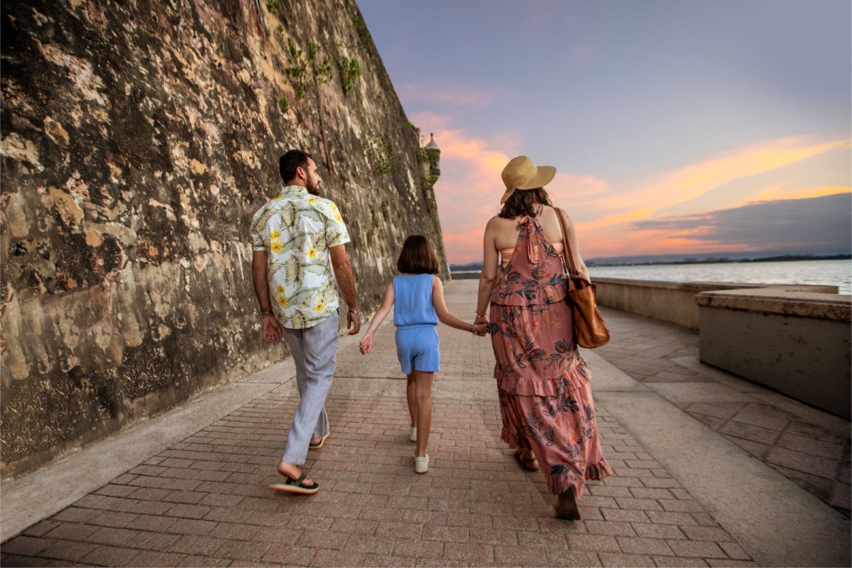 A family explores Paseo de la Princesa in San Juan, Puerto Rico