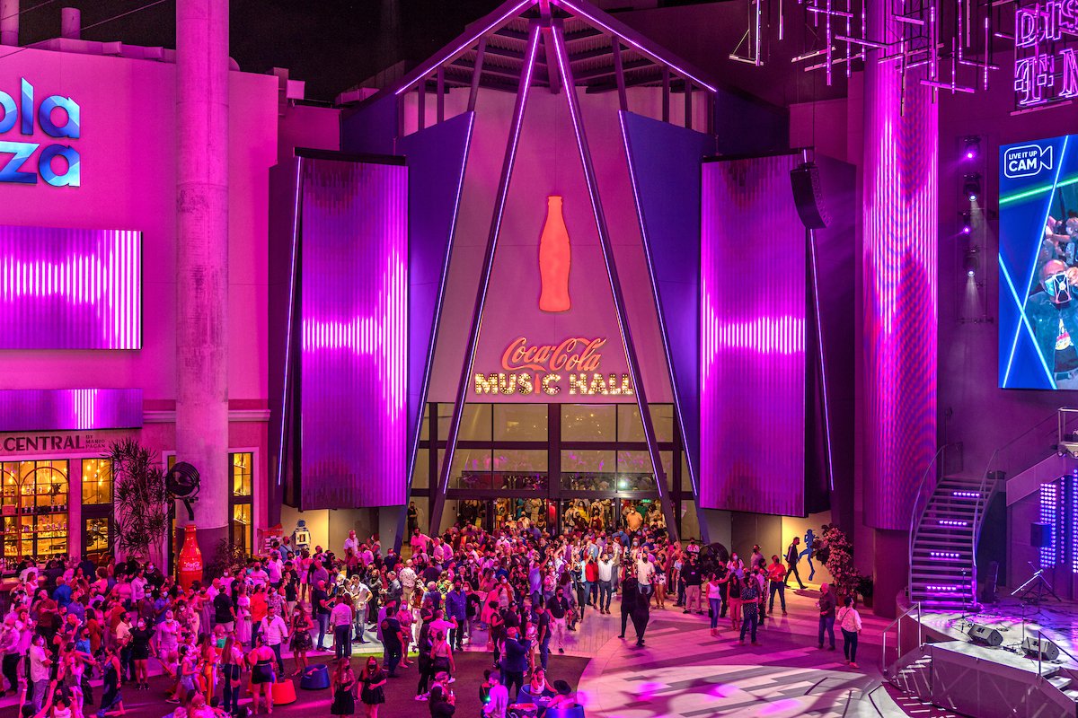 A crowd gathers outside Coca-Cola Music Hall at Distrito T-Mobile