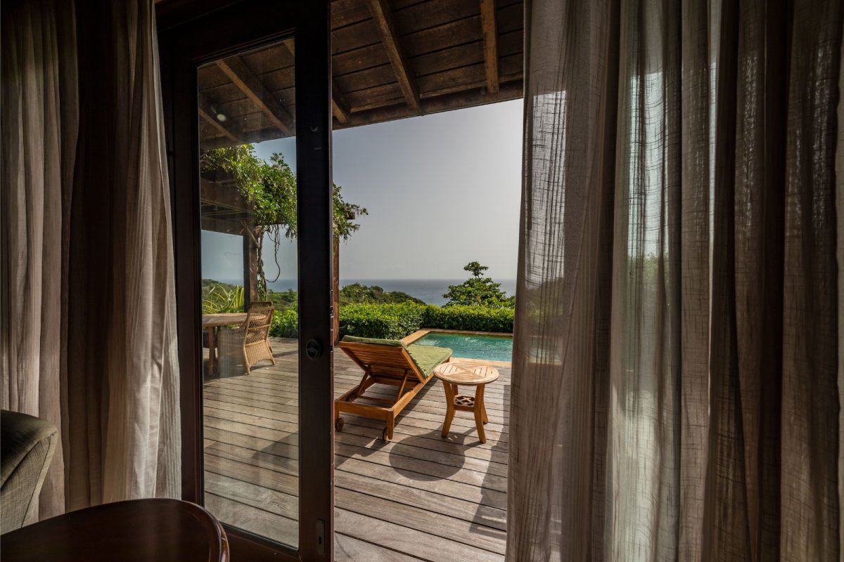 View of the private pool from inside a private villa at Royal Isabela in Puerto Rico.