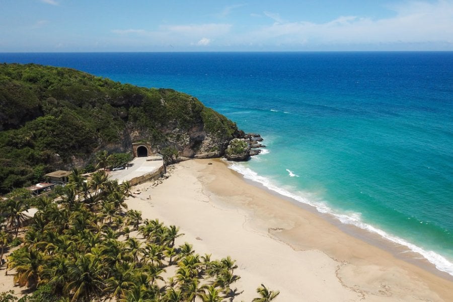 Tunel de Guajataca meeting the beach—iconic stop on a Puerto Rico road trip
