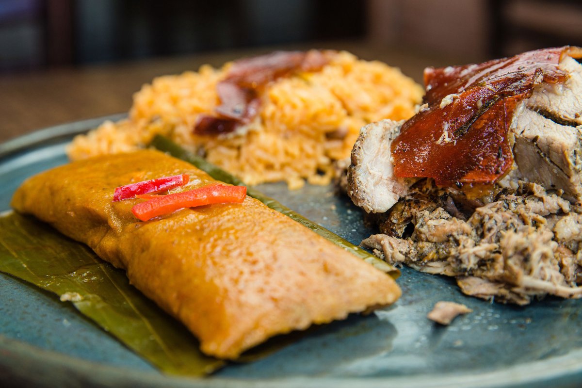A plate of criollo (creole) food at La Alcapurria Quema in La Placita, San Juan, Puerto Rico.