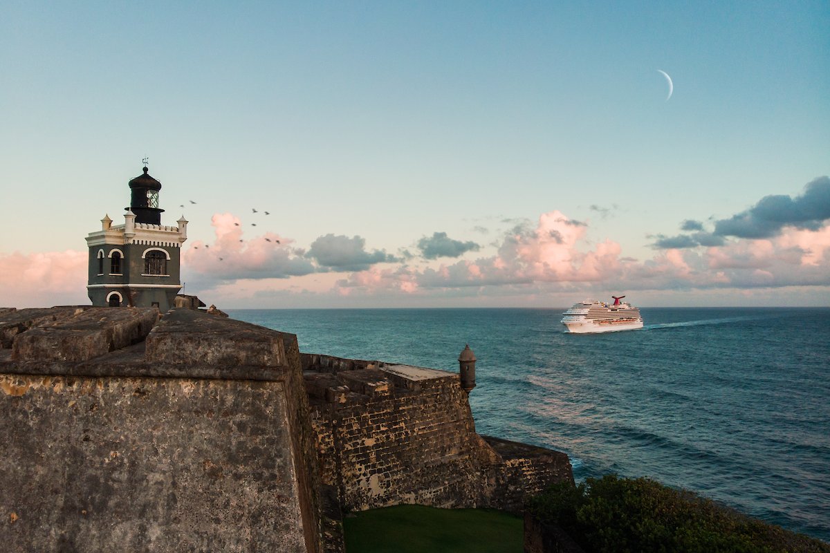 Large cruise ship arriving at the Old San Juan Port at sunrise.