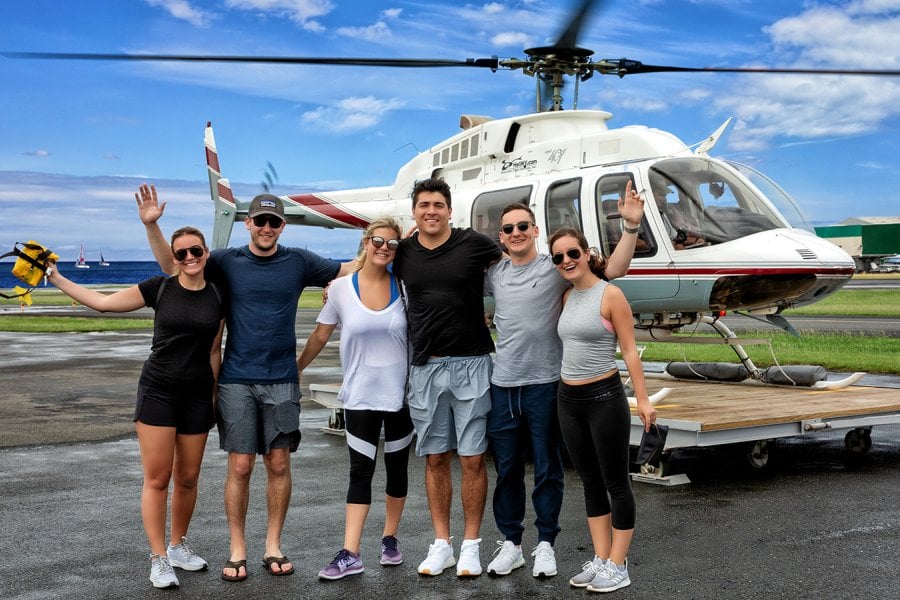 Six young adults just before getting aboard a helicopter to tour Old San Juan.