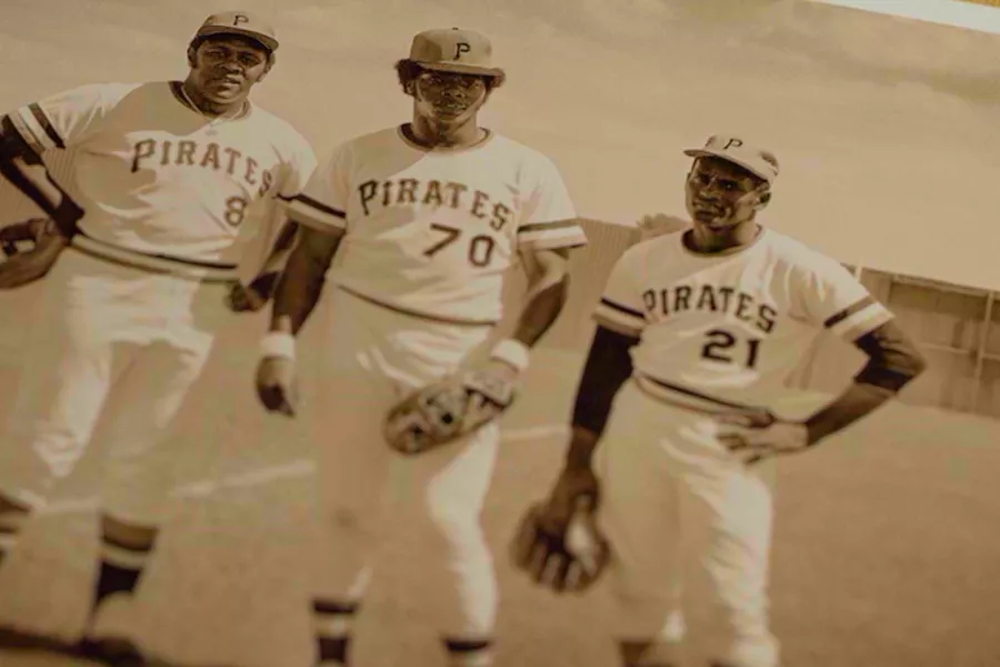 Roberto Clemente with Pirates baseball team.