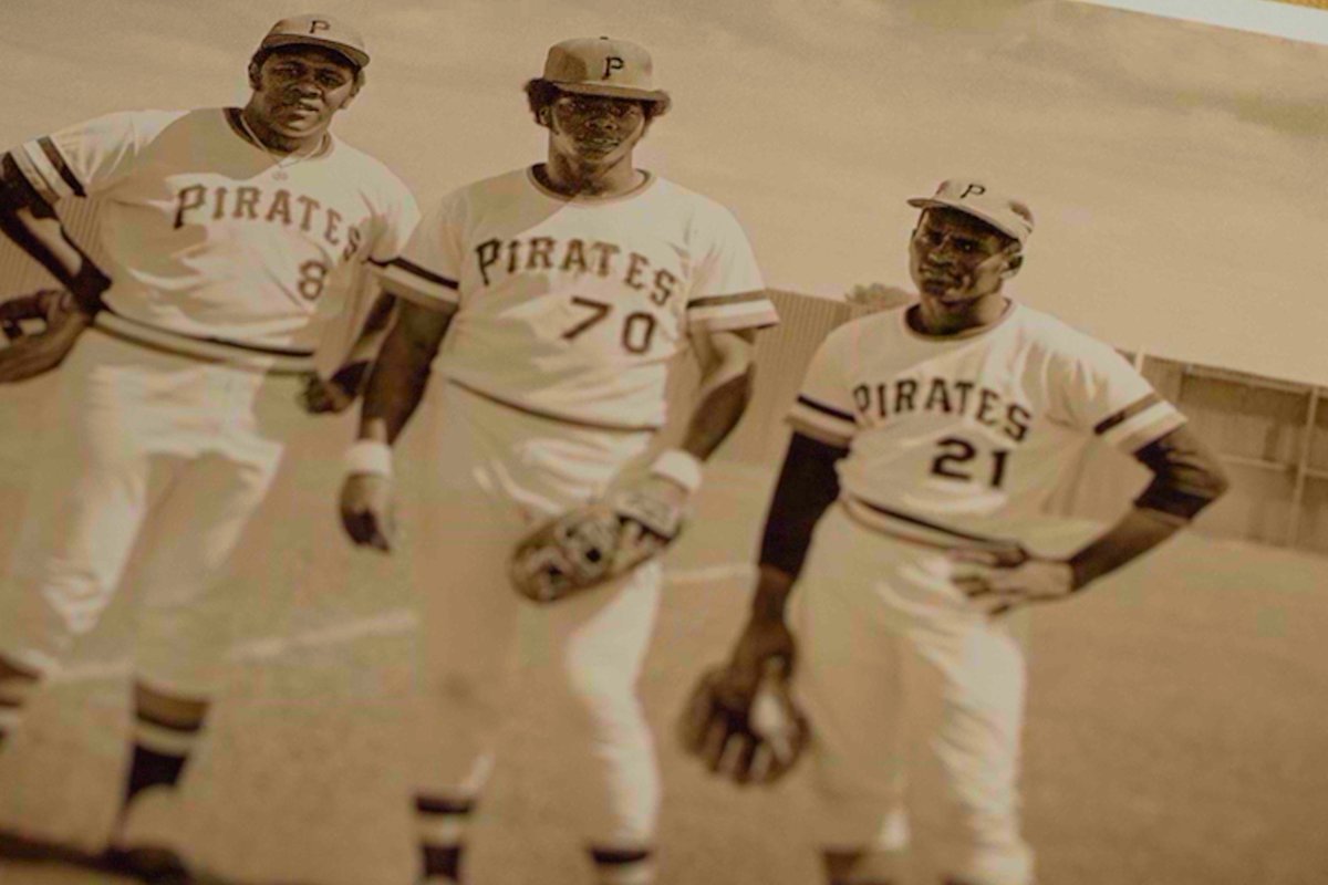 Roberto Clemente with Pirates baseball team.