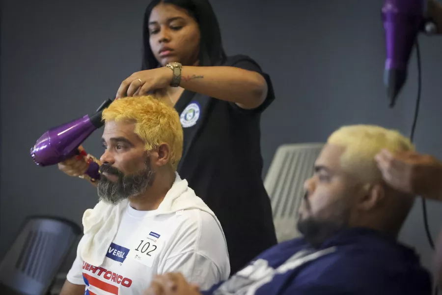 Puerto Rican baseball fans with dyed blonde hair supporting Team Rubio