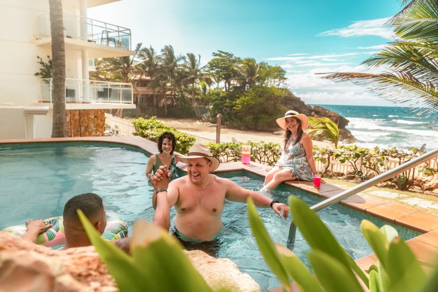 A family enjoys a pool day