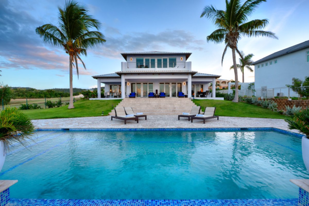 Poolside view of Martineau Belle Playa villa.