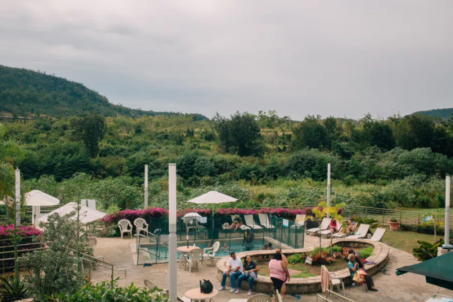 Coamo Hot Springs filled with people.
