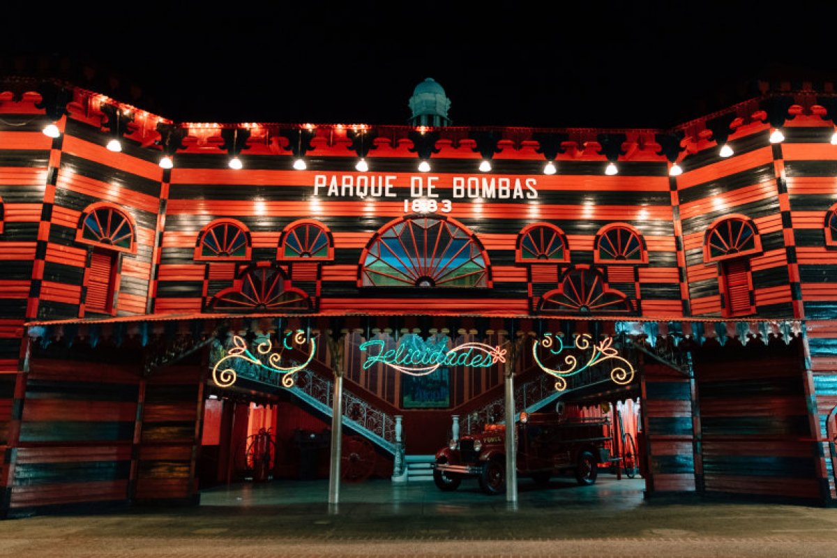 The red-and-black-striped Parque de Bombas, a former fire station in. Ponce, Puerto Rico, is illuminated at night.