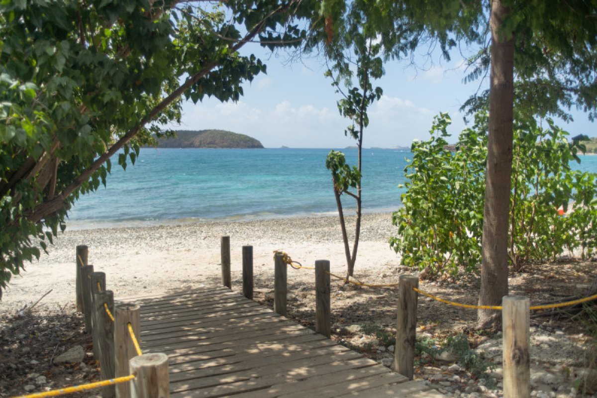 View of a boardwalk at Tamarindo beach in Culebra, one of the best places to enjoy snorkeling in Puerto Rico. 