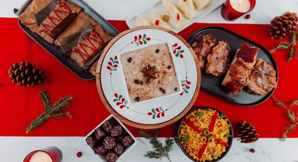 An array of rice, pasteles, and lechon