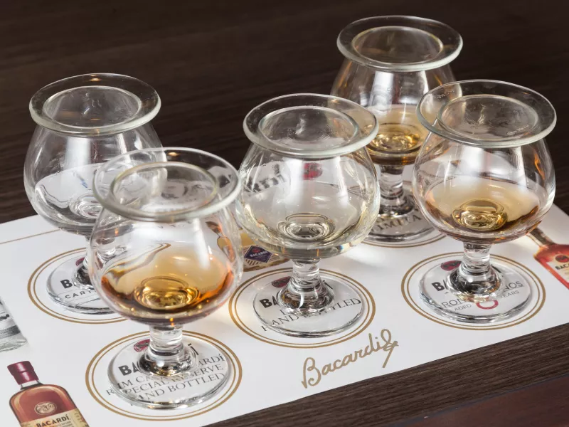 Rum tasting flight at Casa BACARDÍ, part of a popular rum tour in Puerto Rico.