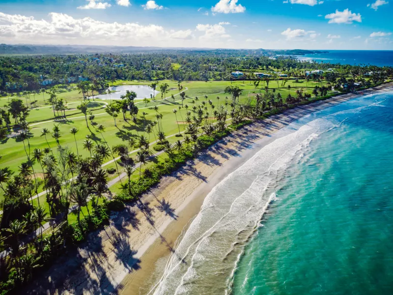 Aerial view of the Ritz-Carlton Golf Course near the beach. 