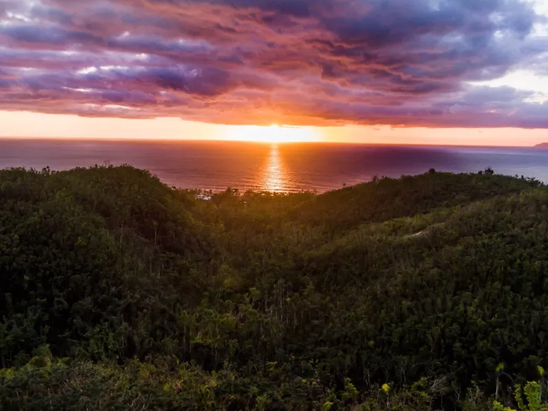 A dramatic sunset over the ocean from puntas rincon in western puerto rico