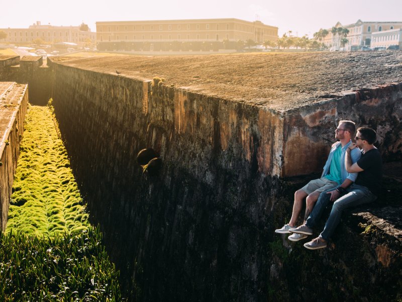 A couple enjoys the view from old ruins