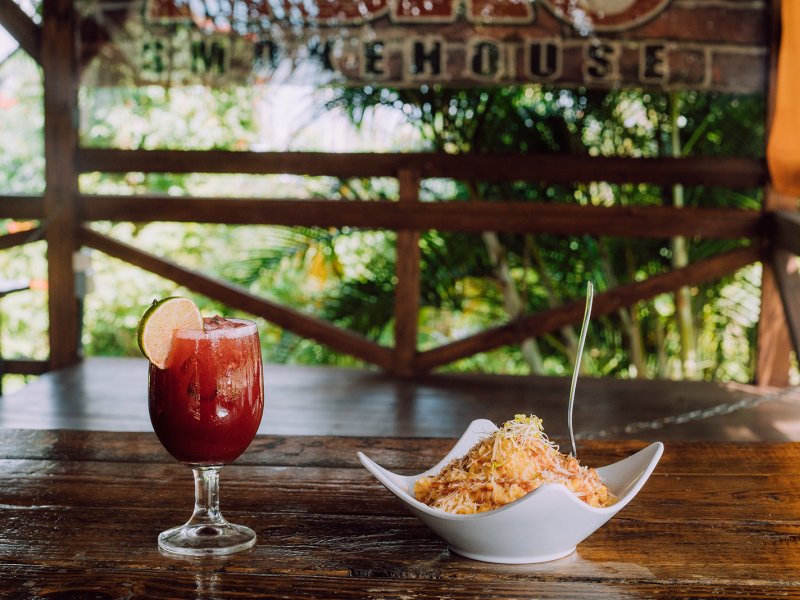 A glass of sangria and creole cuisine at ASAO smokehouse in Ciales
